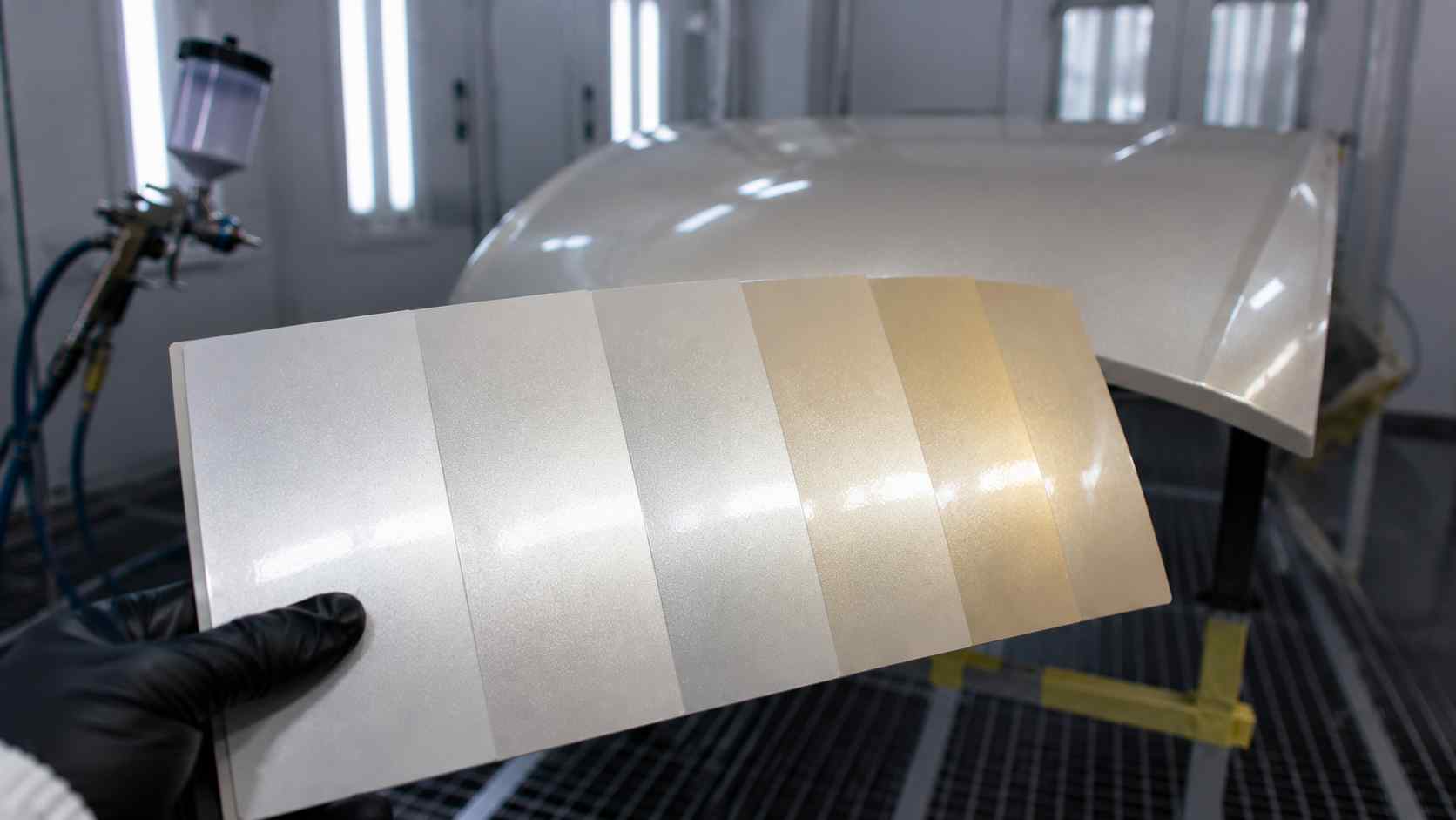 Let-Down Panel for Pearl Paint Matching Stepped let-down panel used to compare pearl paint pass counts during colour matching in Dubai