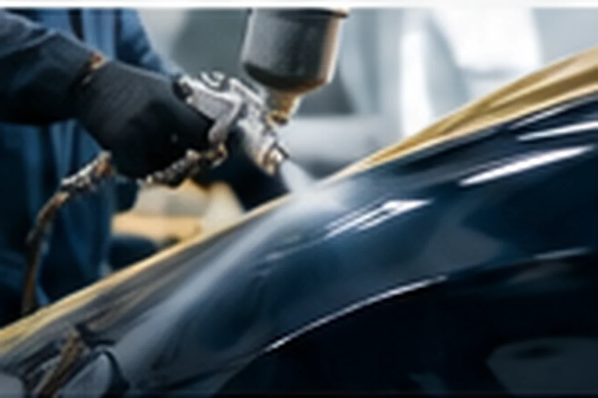 Refinishing a vehicle panel in a paint booth